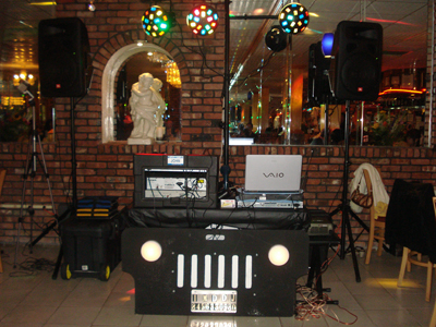 Celebration crowd enjoying a DJ Filipino party