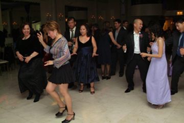Guests dancing on a packed party dance floor